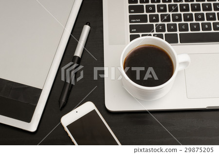 Coffee cup, graphics tablet with a stylus, laptop Coffee cup, graphics tablet with a stylus, laptop 29875205