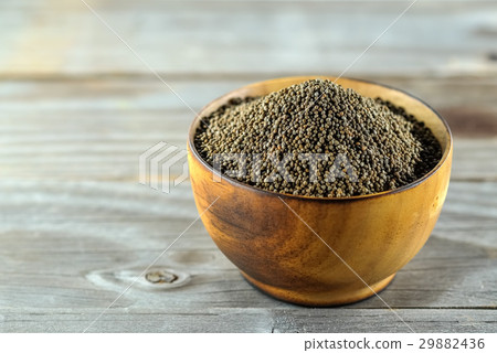 Perilla frutescens or sesame in wood bowl. 29882436