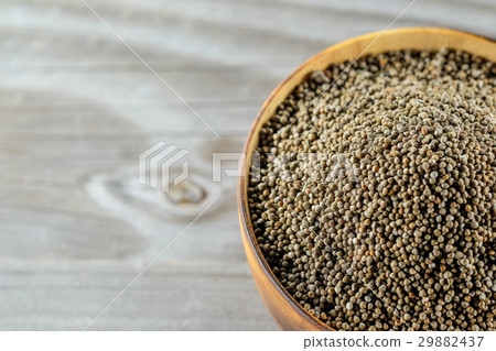 Perilla frutescens or sesame in wood bowl. Perilla frutescens or sesame in wood bowl. 29882437