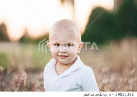 Happy little boy outside Happy little boy outside 29885381