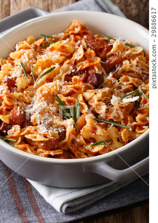 Italian pasta with tomato, bacon and Parmesan 29886617