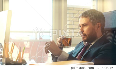 Young confident businessman working on his 29887046