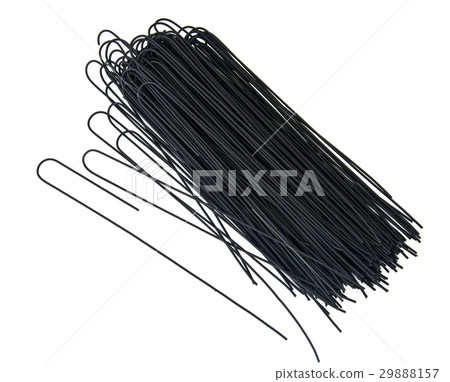 Black spaghetti on white background 29888157