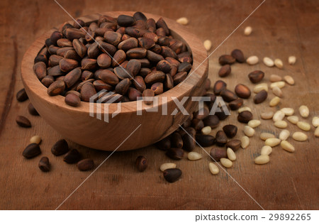 Wooden bowl of pine nuts Wooden bowl of pine nuts 29892265