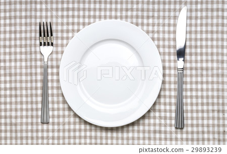 Empty white plate with fork and knife Empty white plate with fork and knife 29893239