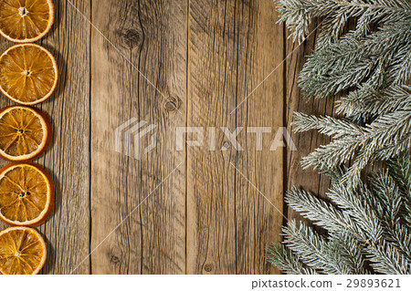 Dried oranges from the tree branches on table. Dried oranges from the tree branches on table. 29893621
