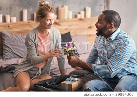 Cute African American man caring about his 29894305