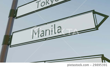 Manila direction sign on road signpost with Asian 29895391