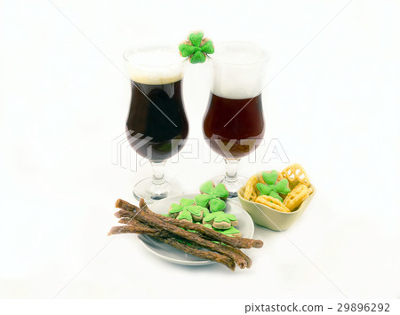 red beer in glasses with green clover red beer in glasses with green clover 29896292