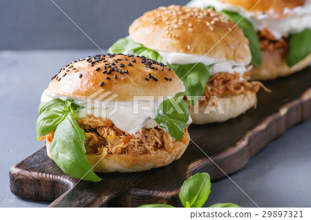 Homemade mini burgers with pulled chicken Homemade mini burgers with pulled chicken 29897321