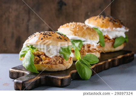 Homemade mini burgers with pulled chicken Homemade mini burgers with pulled chicken 29897324