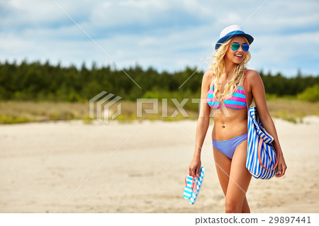 summer holidays, vacation and beach concept - girl in bikini and 29897441