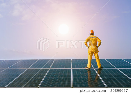 Engineer looking the sun a source of clean energy 29899657