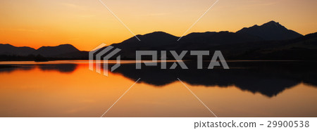 Colorful sunset over lake and mountains 29900538