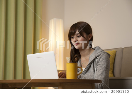 Women in their 20s surfing the net at midnight Women in their 20s surfing the net at midnight 29901550