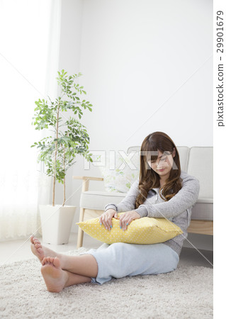 A woman relaxing at home on holiday A woman relaxing at home on holiday 29901679