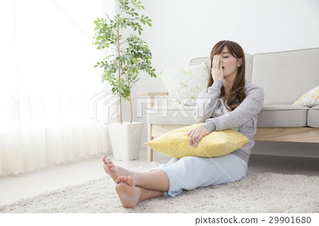 A woman relaxing at home on holiday A woman relaxing at home on holiday 29901680