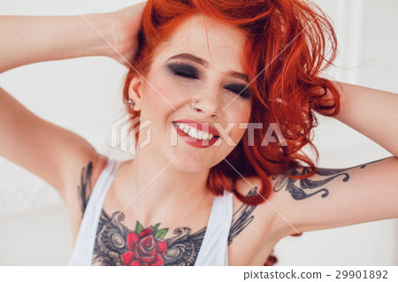 Portrait of a beautiful sexy girl with red hair Portrait of a beautiful sexy girl with red hair 29901892