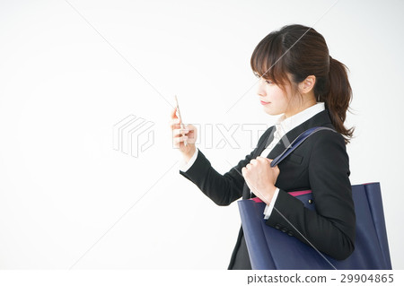 Young business woman commuting to work Young business woman commuting to work 29904865