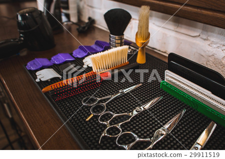 Barber shop equipment on wooden background. 29911519
