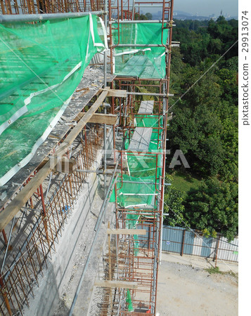 Scaffolding used at the construction site 29913074