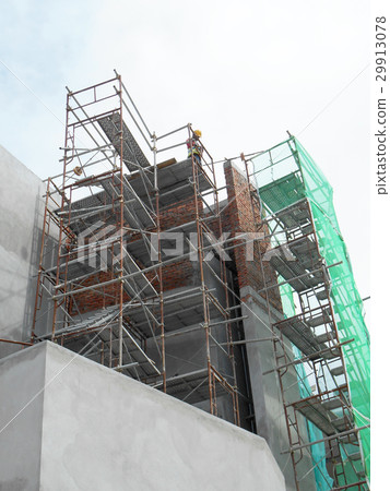 Scaffolding used at the construction site Scaffolding used at the construction site 29913078