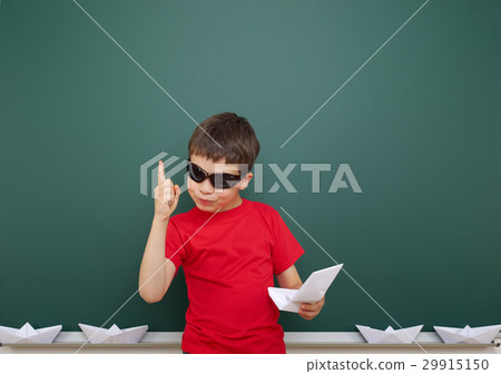 boy on blank school board background 29915150