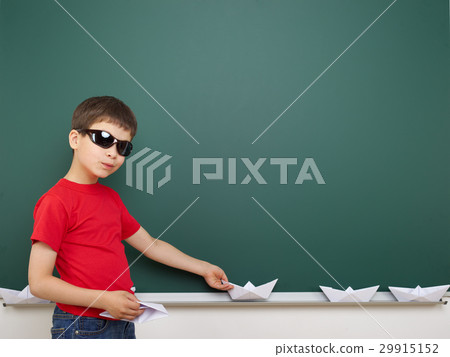 boy on blank school board background 29915152