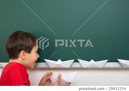 boy on blank school board background 29915154