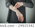 man use cotton and wipe his arm 29915342
