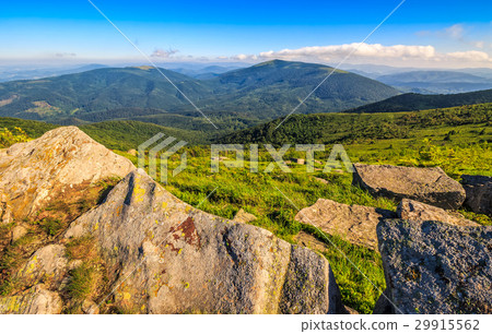 huge stones on the meadow on top of mountain ridge 29915562