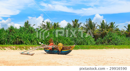 old fishing boat on the sandy shore 29916590