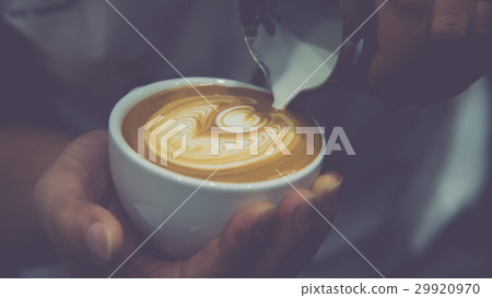 Barista pouring latte froth make coffee latte art Barista pouring latte froth make coffee latte art 29920970