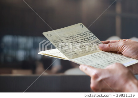 saving account passbook in hands on bank office saving account passbook in hands on bank office 29921139
