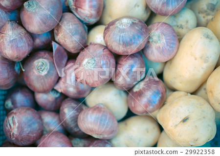Shallot and yam in basket 29922358