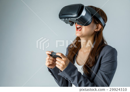 Women wearing VR goggles 29924310