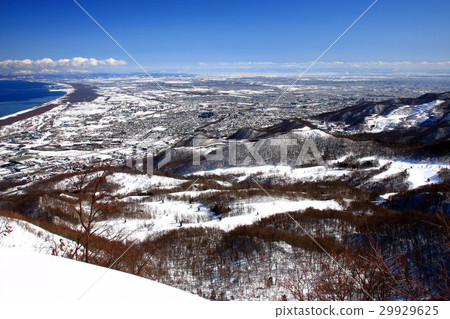 Ishikari Bay seen from early spring's Zenkaku Tengu mountain area and Sapporo city area 29929625