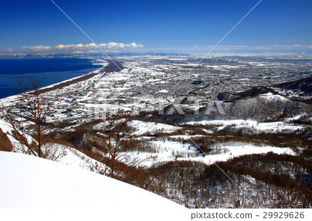 Ishikari Bay seen from early spring's Zenkaku Tengu mountain area and Sapporo city area 29929626