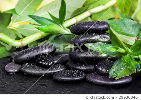 Spa-concept with zen stones and bamboo Spa-concept with zen stones and bamboo 29930040