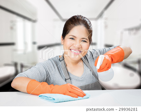 asian housewife sweeping on table 29936281