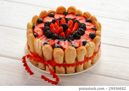 Biscuit cake with berries. Biscuit cake with berries. 29936682