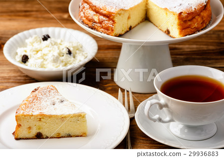 Cheesecake slice on brown wooden background. Cheesecake slice on brown wooden background. 29936883