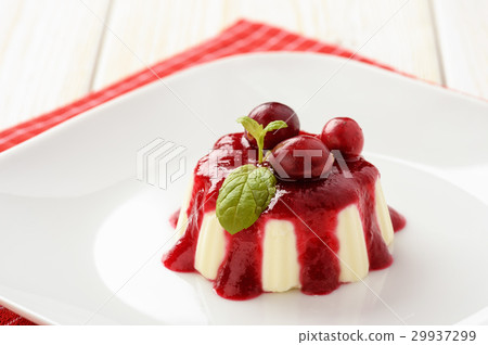 Panna cotta with cranberry mousse. 29937299