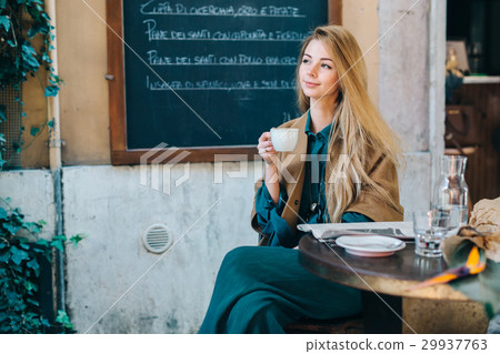 Cafe table young woman drinking coffee lifestyle Cafe table young woman drinking coffee lifestyle 29937763