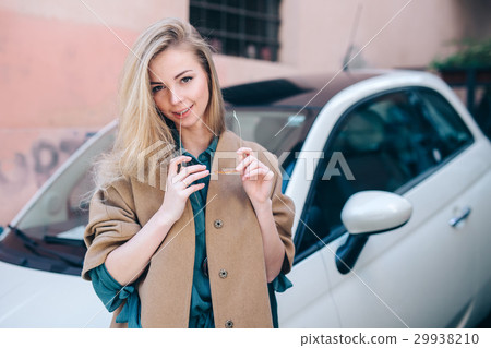 Rental car customer fyoung woman blonde hair Rental car customer fyoung woman blonde hair 29938210