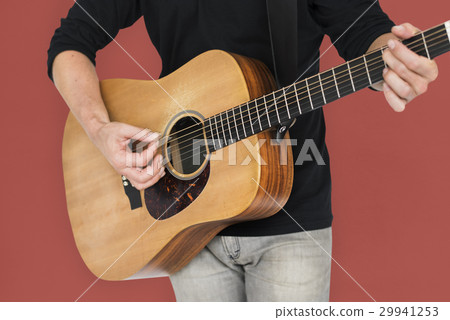 Caucasian Man Playing Guitar Closeup Caucasian Man Playing Guitar Closeup 29941253