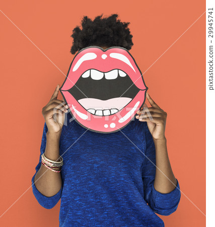 African Woman holding Peper Mouth Over her Face African Woman holding Peper Mouth Over her Face 29945741