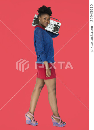 African Descent Woman Holding Jukebox African Descent Woman Holding Jukebox 29945910