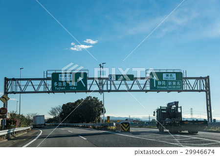 Truck traveling on the Meishin expressway while driving on the Komaki junction Truck traveling on the Meishin expressway while driving on the Komaki junction 29946674