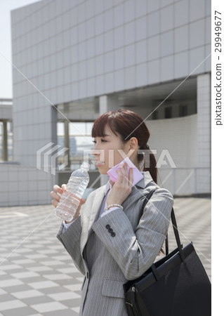 Business woman outdoing measures heat suppression measures hydration Business woman outdoing measures heat suppression measures hydration 29949677